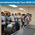 TIA Students gathered around a mentor during an interactive session.